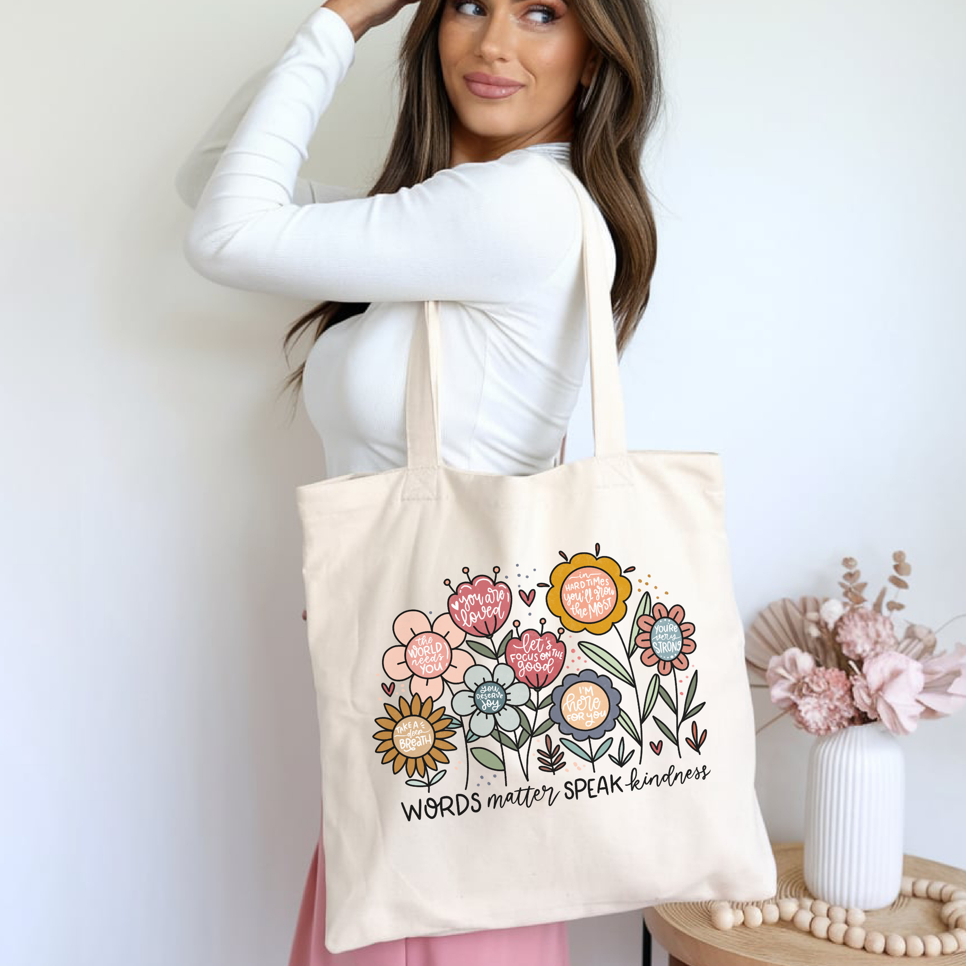 Retro tote bag with wildflower design and affirmations in each flower